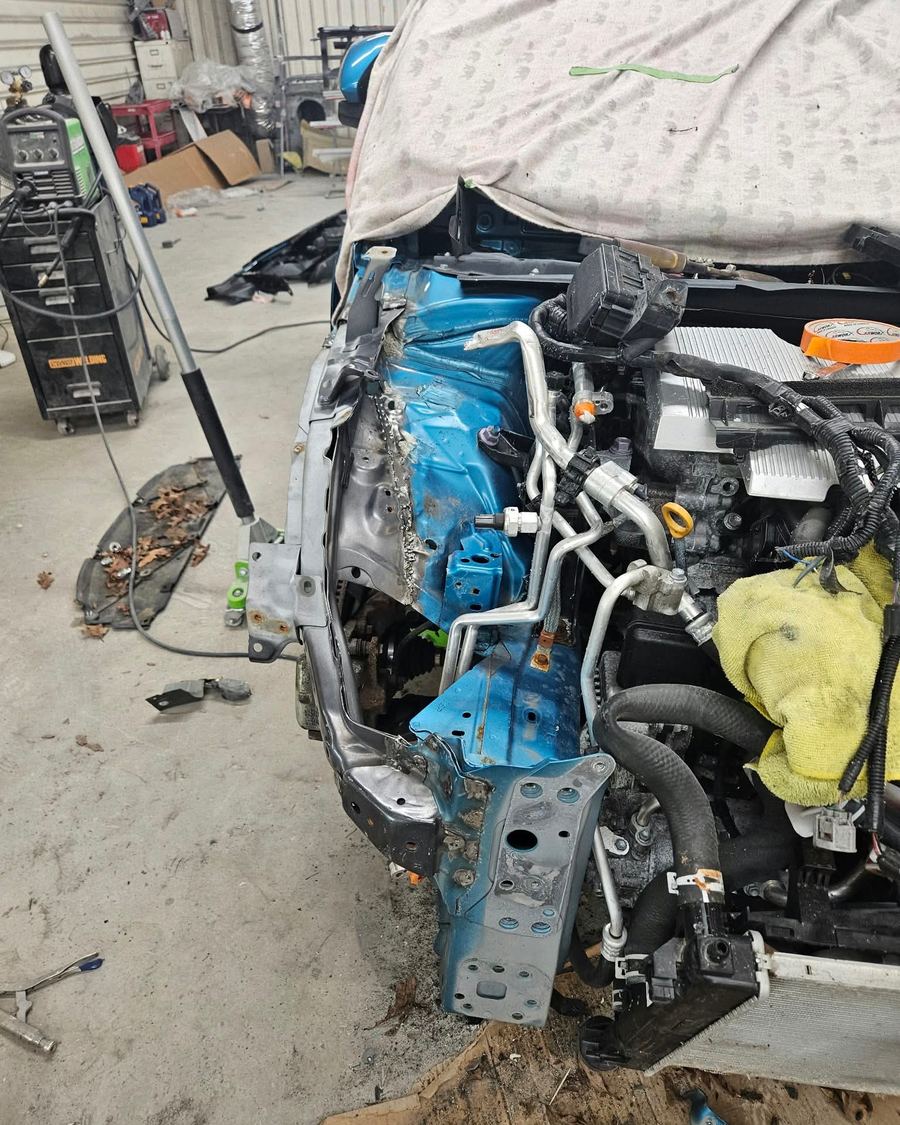 Toyota Prius Prime front end crushed to the engine bay
